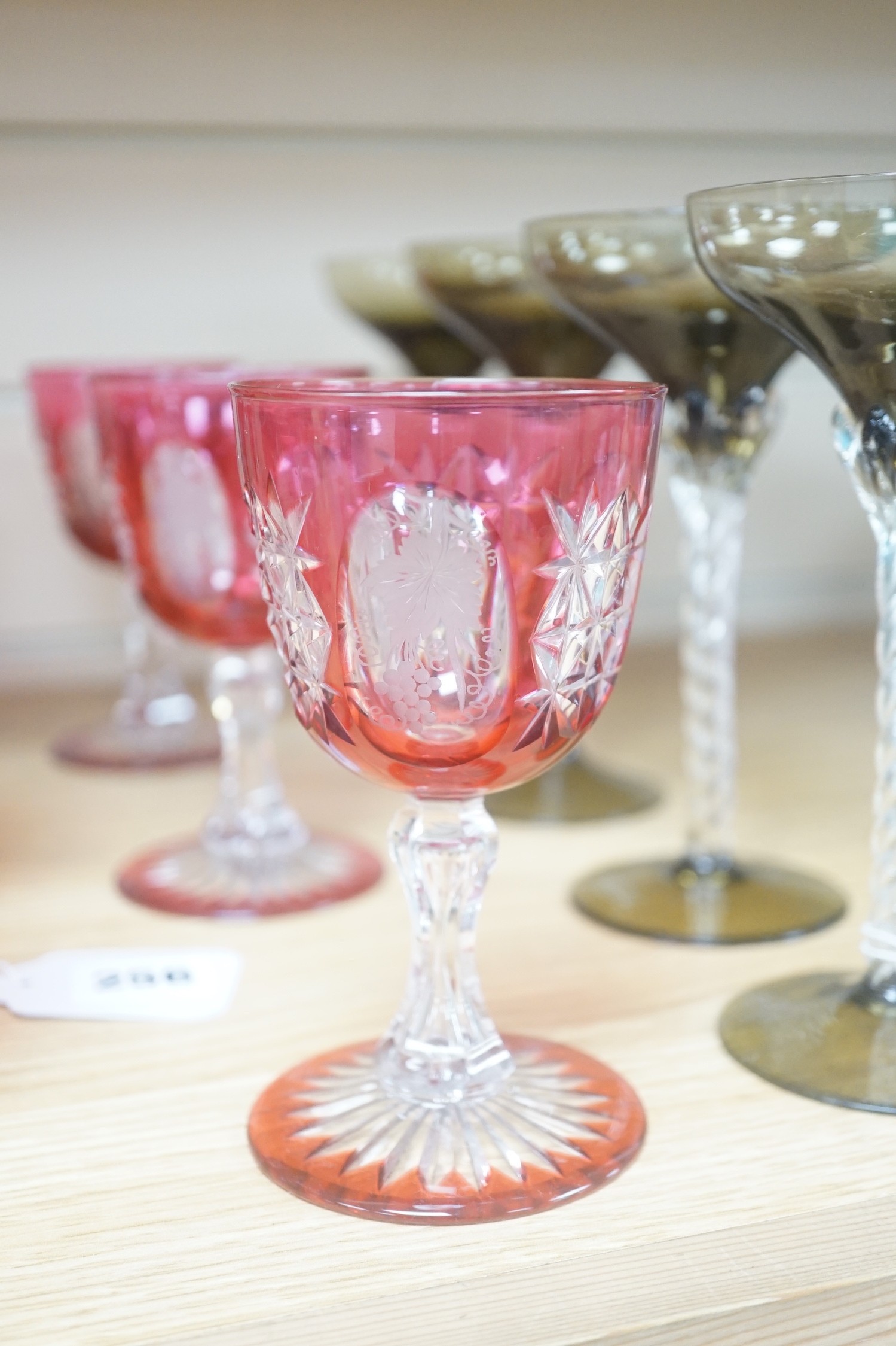 Six cranberry flashed glasses and four others